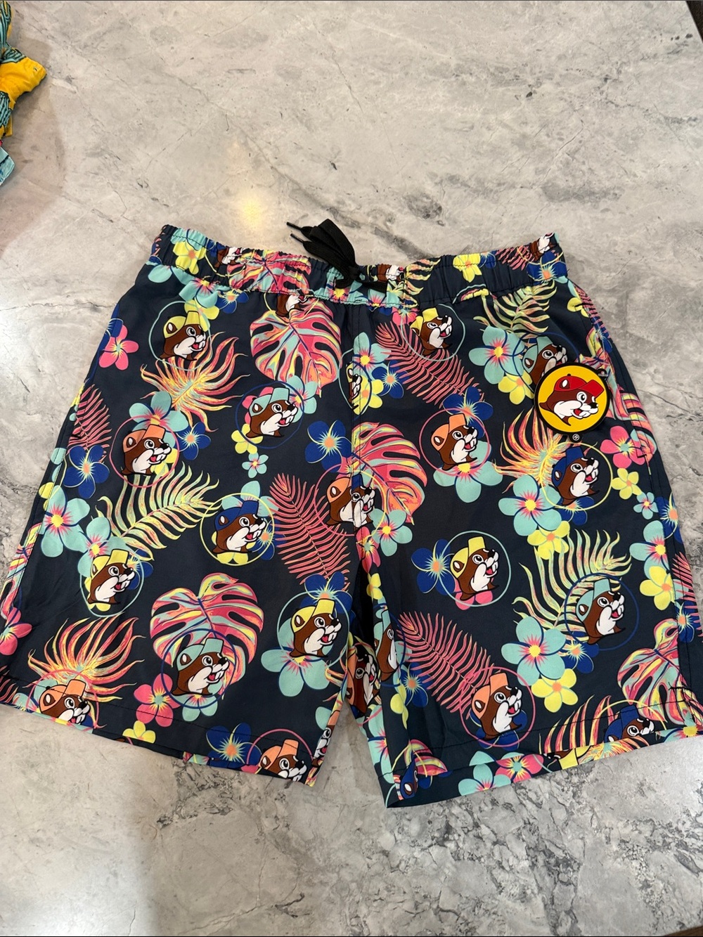 Men's Navy Tropical Print Swim Shorts with Character Motif